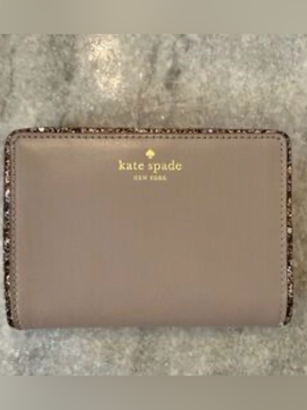 kate spade taupe leather zip wallet with gold logo